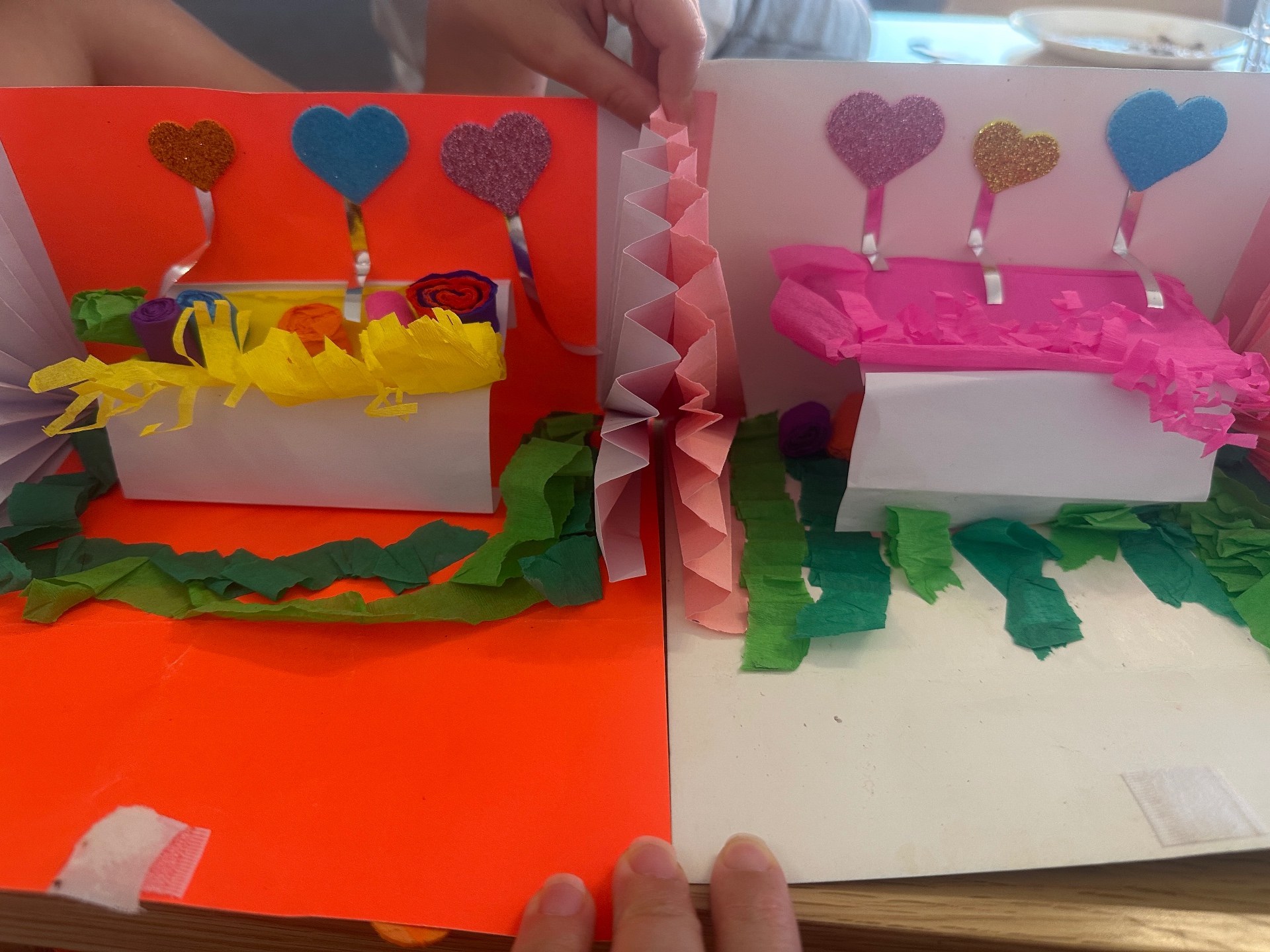 Two cards from the same tray of supplies, side by side