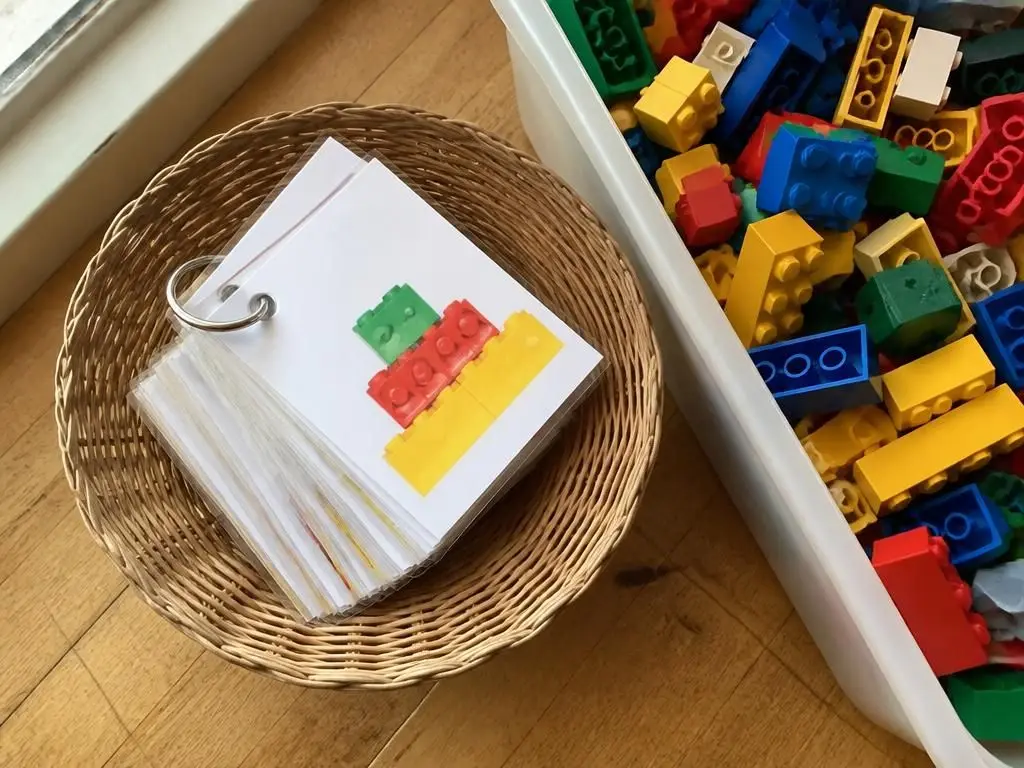 Laminated cards on a ring, living inside the brick tub.