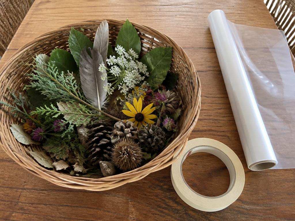 The walk basket: leaves, petals, feathers and pods waiting to be stuck down