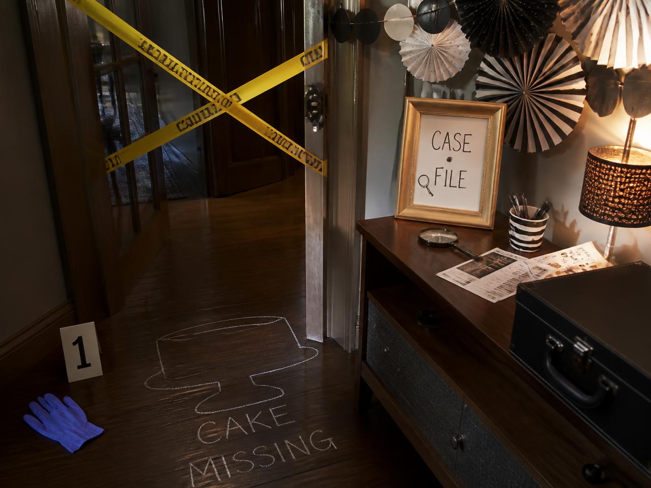 Tape across the door, a chalk outline where the cake was, one dropped glove.
