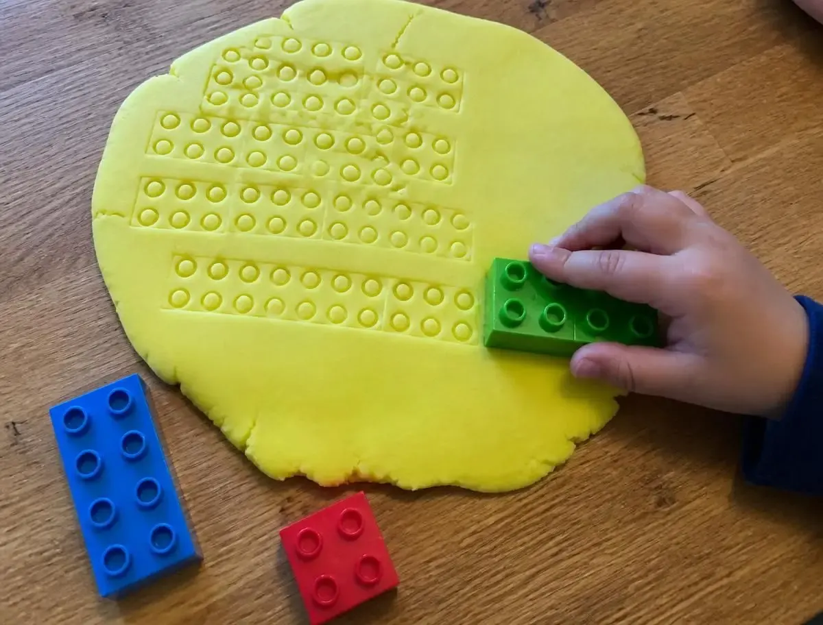 Eight studs per press — multiplication you can count with a finger.