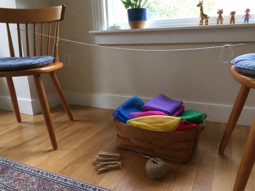 Silks, pegs and string — the whole basket, ready to be pulled out.