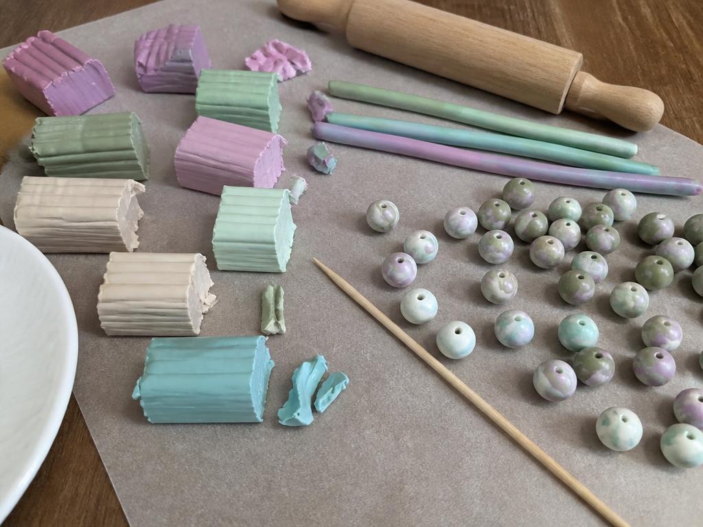 Rolling beads and poking the holes before baking