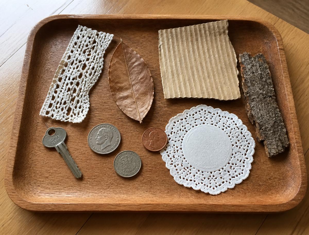 A basket of rubbing-worthy things gathered from around the house.